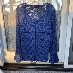 Women’s lacy blue sheer top. Size L